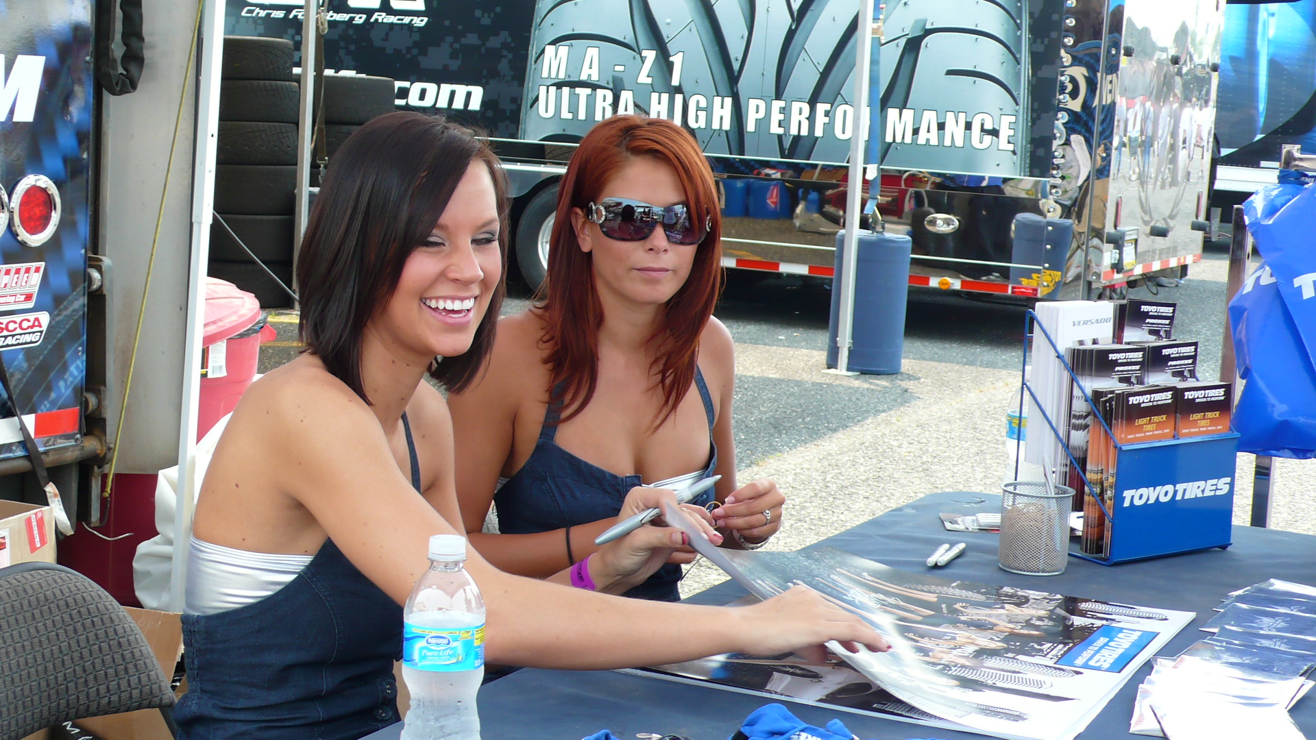 The Toyo Girls are signing autographs today